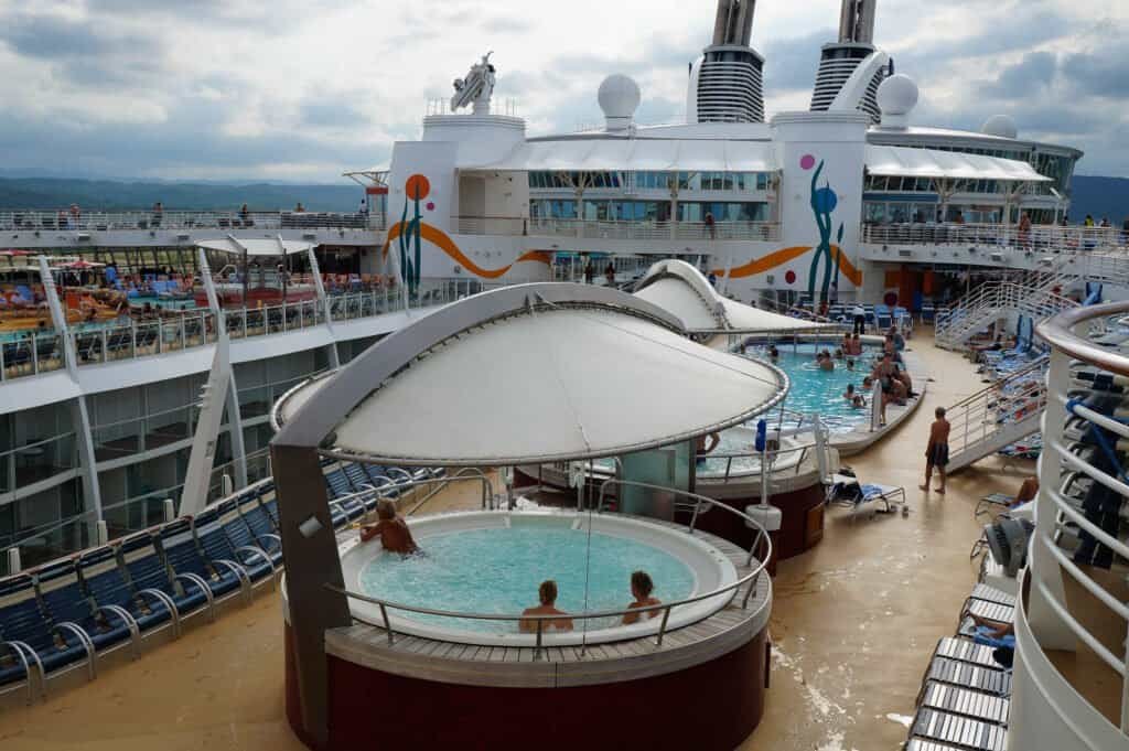Cruise ship deck featuring a hot tub and pool area on the Allure of the Seas cruise ship.