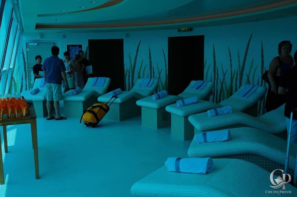 Relaxing Celebrity silhouette cruise ship spa lounge with comfortable lounge chairs, towels, and a tranquil atmosphere fo.