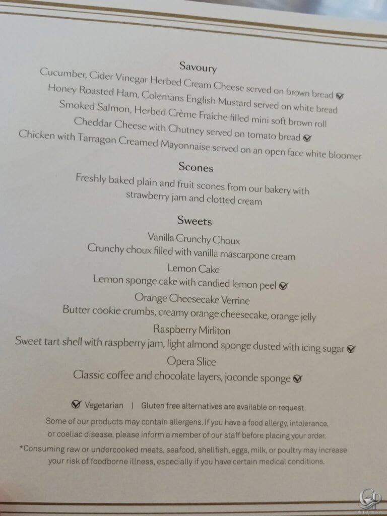 Cunard Queen Anne Queens Room afternoon tea menu with finger sandwiches, fresh scones, pastries and traditional British desserts.