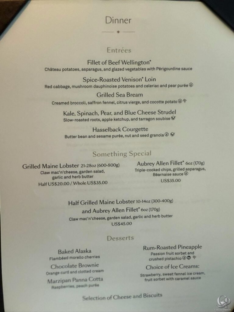 Cunard Queen Anne Britannia Club dinner menu featuring beef Wellington, venison loin, grilled sea bream, lobster upgrades and desserts.